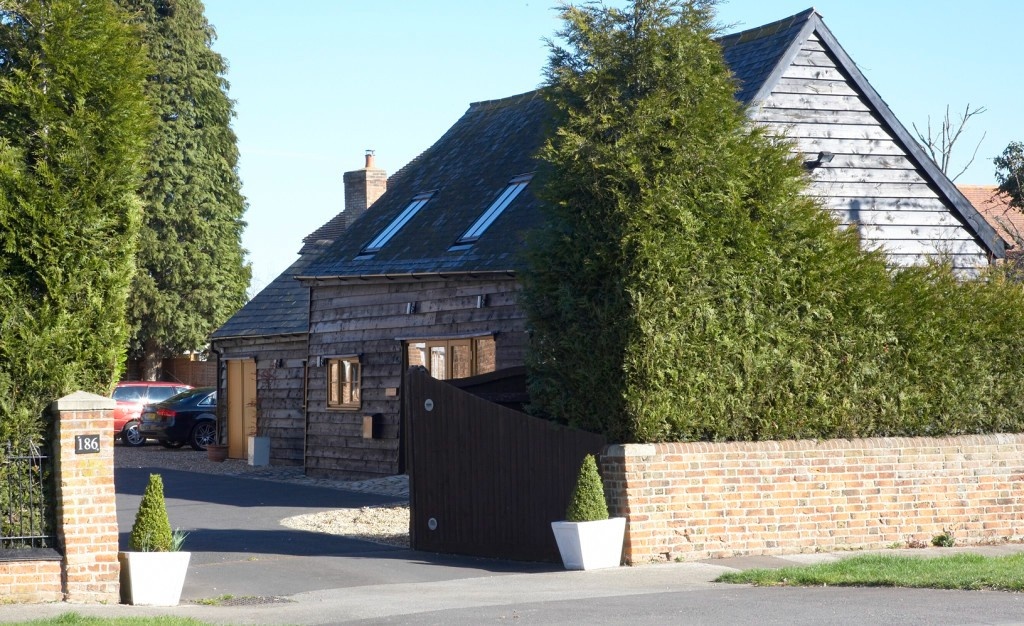 Wooden house with greenery